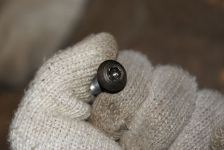 Deformed bolt hole